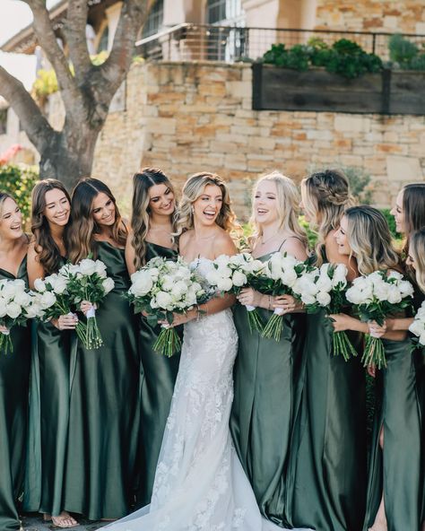 Hands up for the gorgeous bride @cheermegss! Featuring the Lydia dress in Shiny Satin Olive 💚 #BIRDYGREY #birdyinthewild Venue: @tehamagolfclub @tehamaevents Photographer: @kimberlymacdonaldphotography Florist: @gardenpartysf Bridesmaids In Emerald Green, Bridesmaids Dark Green Dresses, Emerald Green Fall Bridesmaid Dresses, Winter Green Bridesmaid Dresses, Evergreen Wedding Colors, Emerald Bridal Party, Dark Green Bridal Party, Green Wedding Bridesmaids, Emerald Green Bridal Party