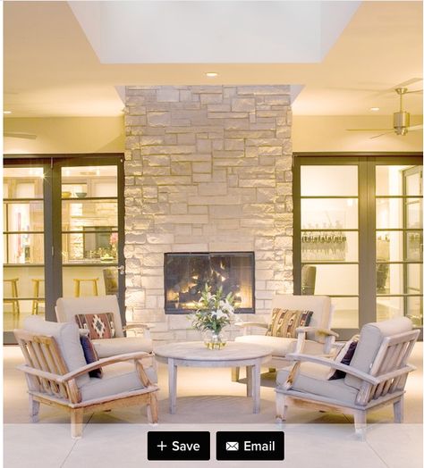 I like the doors on either side of the indoor/outdoor fireplace (don't like the stonework) White Stone Fireplaces, Indoor Outdoor Fireplaces, Modern Patio Design, Outdoor Fireplace Designs, Armoire Dressing, Outdoor Fireplace Patio, Double Sided Fireplace, Contemporary Patio, Patio Fireplace