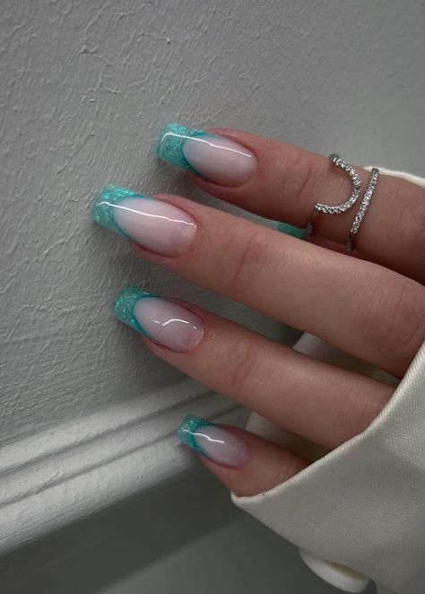 Explore the vibrant world of turquoise nails with these 25 stunning designs! Perfect for spring and summer, you'll find lots of pretty nail ideas, just like these turquoise French tip nails. Nails Inspiration Turquoise, French Teal Nails, Teal Abstract Nails, Prom Nails For Teal Dress, Nails Inspiration Teal, Prom Nails Turquoise, French Nails Turquoise, Aqua Prom Nails, Nail Inspo Turquoise