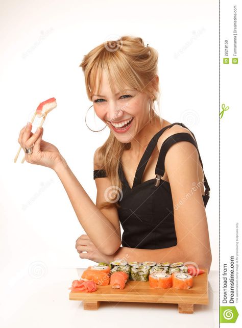 Young woman eating sushi with chopsticks Eating Stock Photo, Eating Sushi Pose Reference, Eating Sushi Pose, Holding Chopsticks Reference, Sushi Chopsticks, Pose Practice, Eating Sushi, Using Chopsticks, Woman Eating