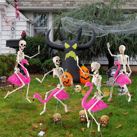 Package Contents: you will get 4 pieces of plastic lawn flamingos in 2 styles, 4 pieces of skeletons, 8 pieces in total; It is also equipped with a hot melt glue gun and hot melt glue stick to better fix the product, a practical combination for you to decorate your Halloween party Reliable and Sturdy: our Halloween skeleton and flamingo are mainly made of plastic, and the flaming equipped with metal legs to withstand different weather condition, not easy to fade Flamingos And Skeletons, Skeleton Riding Flamingos, Skeletons Riding Flamingos, Skeleton In Yard Ideas, Flamingo Trunk Or Treat Ideas, Outdoor Skeleton Decor, Flamingo Trunk Or Treat, Flamingo Skeleton, Outdoor Skeleton