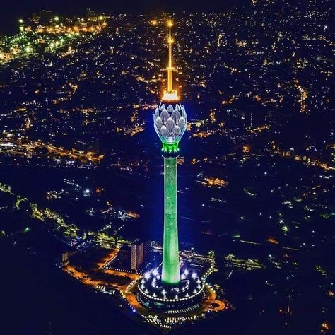 The glowing of Lotus Tower at night #SriLanka Lotus Tower Sri Lanka, Lotus Tower, English Magazine, Bob Marley Art, Tourism Day, City Skylines, Sri Lanka Travel, Tower Building, Unique Buildings