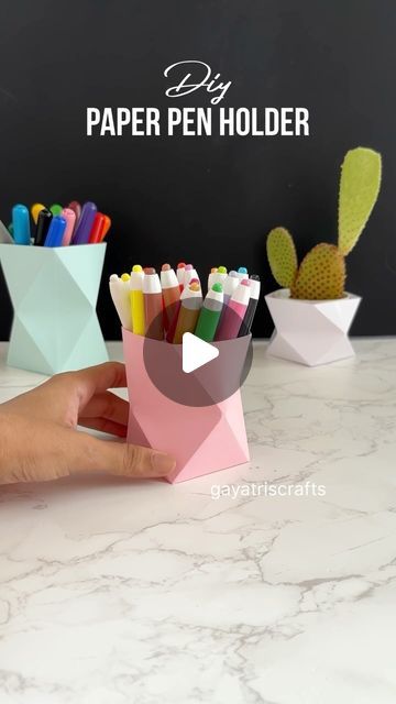 Gayatri chouhan on Instagram: "Diy Paper Pen Holder #carfts #papercrafts #paperart #papercrafting #handmade #diy #art #fun #penholder #holder" Paper Pen Holder, Paper Pen, Instagram Diy, Pen Holder, Pen Holders, Diy Paper, Diy Art, Paper Art, Origami