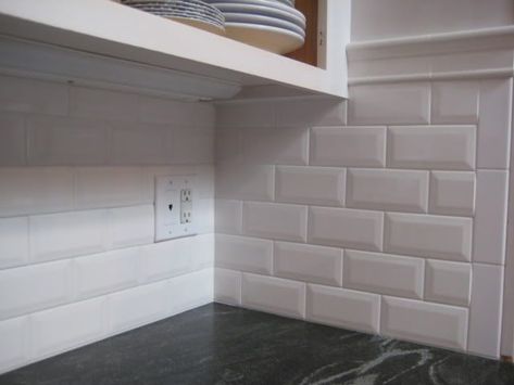 Marty & Katie's & Linda's Kitchen: beveled white subway tiles (3x6) in a brick pattern with bright white grout. Description from pinterest.com. I searched for this on bing.com/images White Subway Tiles Kitchen Backsplash, White Beveled Subway Tile, White Tile Kitchen Floor, White Subway Tile Kitchen, Bevelled Tiles, Tile Border, Beveled Subway Tile, Condo Bathroom, Tile Stickers Kitchen