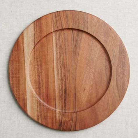 Gorgeously grained acacia wood charger underpins place settings with the warm look of natural wood in a clean, rimmed shape. Perfect for chic dinner parties and family feasts, our Carson charger dresses up any meal when placed under a dinner plate. Cut from seasoned acacia wood, each charger is turned to create its clean, rimmed shape. Pair with any of our Carson acacia serving pieces for a unified, modern organic table.   View all Carson Serveware      Acacia wood  Wipe clean with damp cloth  M Wooden Chargers, Buffet Plates, Table Chargers, Wood Chargers, Organic Table, Wood Plates, Fancy Table, Wood Plate, Los Angeles Chargers