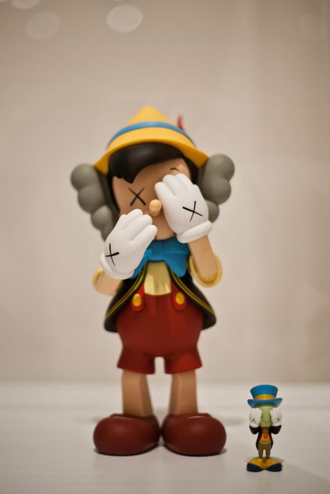 KAWS x Companion (Pinocchio and Jiminy) Kaws Toys, Kaws Companion, Kaws Iphone Wallpaper, Kaws Wallpaper, Claes Oldenburg, Vinyl Art Toys, High Museum, Jasper Johns, Vinyl Toys