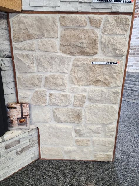 Interior Limestone Wall, Natural Stone Patio Design, Tapered Stone Fireplace, Stone Wall Master Bed, Stone Tile For Fireplace, Stone And White Exterior, Veneer Stone Fireplace, Limewash Range Hood, Stone Wall Dining Room