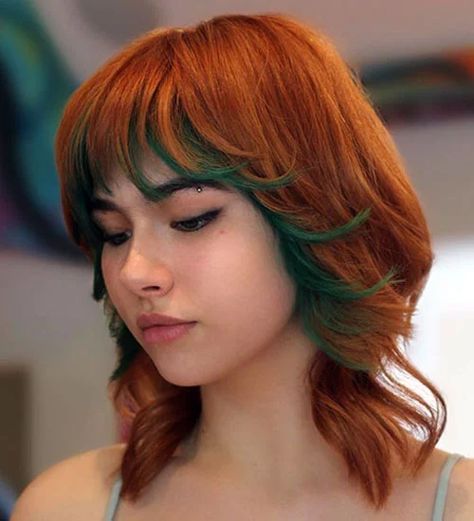 67 Stunning Wolf Cut Hair Ideas For Women To Copy in 2023 Coloured Hair Bright, Natural Ginger Hair Dye Ideas, Peach And Green Hair, Orange And Green Hair Color, Green Strands Hair, Pink And Green Short Hair, Copper And Green Hair, Ginger And Green Hair, Bright Hair Colors Short