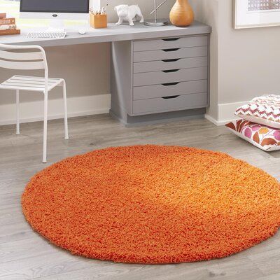 Features:This product is not moisture resistant. Material: PolypropyleneMaterial Details: Construction: Machine MadeTechnique: ShagOne-of-a-Kind: NoRemarks/Condition Details: Backing Material: YesBacking Material Details: CottonRug Shape (Rug Size: Round 4', Round 3'3", Round 7'): RoundRug Shape (Rug Size: Oval 8' x 10', Oval 3'3" x 5'3"): OvalPrimary Color: Tiger OrangePattern: Solid ColorFringe / Tassel: NoPurposeful Distressing Type: No DistressingHoliday / Occasion: No HolidayRug Sets: NoPro 80s Rugs, 80s Rug, Coffee Splash, Basement Suite, Tiger Orange, Tiger Rug, Floor Heating, Office Guest Room, Orange Rug