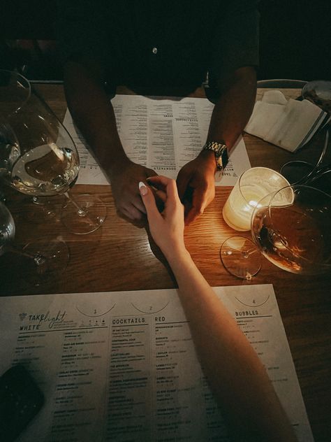 a low lit dinner, a woman’s hand is being held by a partner . Wine glasses are all around and menus sitting on a wooden table. Lowkey Relationship Pictures, Living Rooms Ideas, God Centered Relationship, Soft Launch, Vision Board Images, Modern Living Room Decor, Vision Board Photos, Secret Relationship, Rooms Ideas