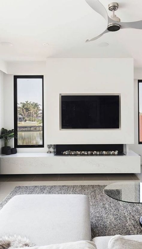 Tv Stove Wall, Media Wall With Window On One Side, Tv Wall Design Between Two Windows, Tv Wall Design With Window, Fireplace Above Tv, Minimalist Fireplace With Tv, Living Room Tv Wall With Windows, Under Tv Fireplace, Tv Wall With Windows