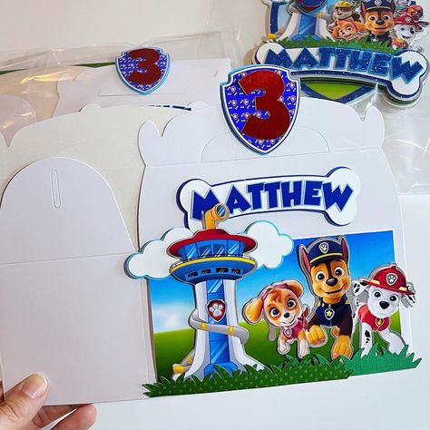 Paw Patrol Favors Boxes 🐾 Matching our favorite paw patrol cake topper. Our party favor box is perfect for any occasion. It’s versatility makes it ideal for livening up a big party or taking it to your child’s school to gift to little friends. #partyfavorsforkids #pawpatrolpartytheme #personalizedpawpatroltheme #papeleriapersonalizada #customstationaryitems #sugarlandtx Paw Patrol Cake Topper, Paw Patrol Favors, Paw Patrol Gifts, Paw Patrol Birthday Theme, Paw Patrol Cake, Paw Patrol Birthday Party, Birthday Captions, Paw Patrol Birthday, Party Favor Boxes