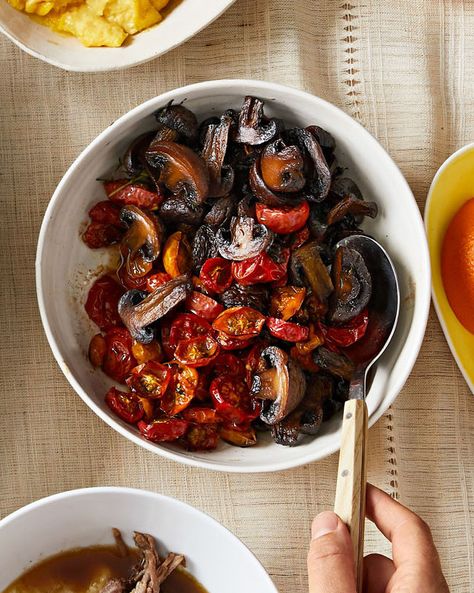 Roasted Tomatoes and Mushrooms | Martha Stewart - A turn in the oven transforms cherry tomatoes into sweet wonders and brings out the earthy flavor of cremini mushrooms. The side dish is an integral part of our Make-Ahead Southern Brunch Menu. #southernrecipes #brunchideas Roasted Tomatoes And Mushrooms, Mushroom And Cherry Tomato Recipes, Oven Mushrooms, Mushroom Tomato Recipe, Southern Brunch, Oven Roasted Mushrooms, Mushroom Tomato, Roasting Vegetables, Cherry Tomato Recipes