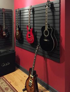 Hang Guitar On Wall, Guitar Storage Cabinet, Guitar Hanging Ideas, Music Room Office, Hanging Guitars, Music Room Design, Guitar Storage, Guitar Wall Hanger, Home Music Rooms