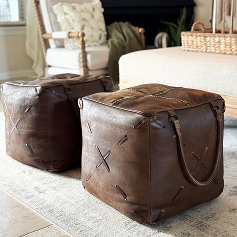 <p>Our <strong>Square Leather Pouf Ottoman</strong> brings a touch of sophisticated comfort and gorgeous style to your space. Whether you need some extra seating or just a place to put your feet up this handsome leather stool is the perfect piece to add to any room. The warm tone will coordinate with any decor style and the handles allow this for easy transfer when needed for extra seating.</p> Winter Pines, Ottoman Leather, Leather Pouf Ottoman, Cabin Furniture, Ski House, Leather Stool, The Pines, Shabby Chic Farmhouse, Warm Tone