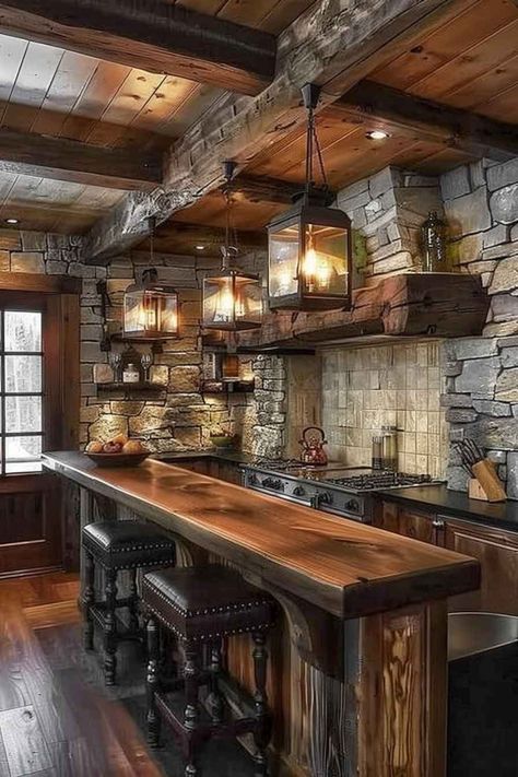 Cozy rustic kitchen bar with a solid wood countertop, stone walls, and lantern-style pendant lights, creating a warm and inviting atmosphere. Wood Grain Tile Kitchen, Cabin Countertop Ideas, Rustic Kitchen Ideas On A Budget, Rustic Kitchen Bar, Cozy Cabin Kitchen, Log Cabin Kitchens, Log Cabin Kitchen, Beautiful Houses Exterior, Creative Bathroom Design