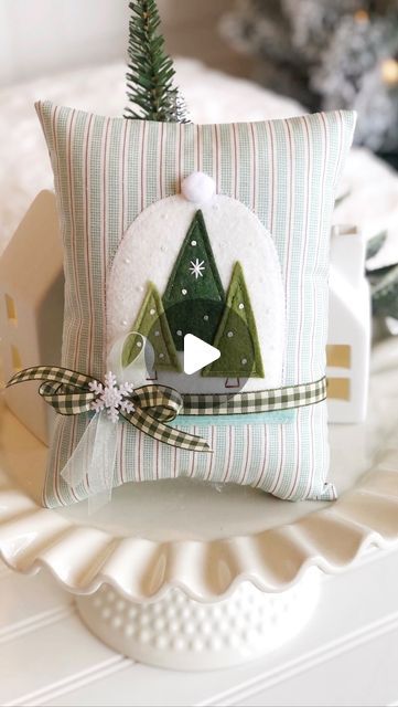 Eilene Johnson on Instagram: "Take any felt ornament pattern in my shop and turn it into a mini pillow! Just applique the felt shapes onto any size pillow you choose. Perfect for bowl fillers, tiered trays and fill ins for shelf decor ✨🙌🏻 . Winter Snow Globe pattern for sale in my Etsy shop. . #simplyeilene #applique #feltornaments #minipillow #tieredtraydecor #christmasproject #christmastreedecorating" Christmas Bowl Fillers Ideas, Bowl Fillers Ideas, Bowl Filler Ideas, Christmas Bowl Fillers, Winter Snow Globe, Felt Shapes, Felt Ornaments Patterns, Christmas Bowl, Felt Ornament