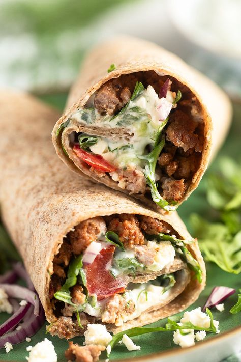 Make these delectable Greek-style lamb wraps! Featuring juicy ground lamb, ripe tomatoes, crisp red onions, and creamy tzatziki sauce, all nestled in soft tortillas. Perfect for a quick lunch or a satisfying dinner. #thefastrecipe #GreekFood #LambWraps #Tzatziki #MediterraneanCuisine #QuickMeal #EasyDinner #DeliciousEats #FoodieFaves #TortillaLove #FreshFlavors #SatisfyingBites #HealthyEating #HomeCooked #GourmetWraps #TastyTreats Lamb Wraps Tzatziki Sauce, Lamb Wraps Recipes, Lamb Sauce Recipes, Private Chef Business, Lamb Wraps, Ground Lamb Recipes, Lamb Sauce, Soft Tortillas, Smashed Potatoes Recipe