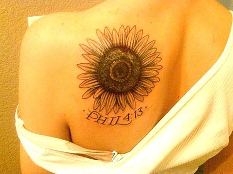 first tattoo. the sunflower was in memory of my grandma, it was her favorite flower, and the verse is my favorite bible verse Small Memorial Tattoos Sunflower, Sunflower Faith Tattoo, Sunflowers Facing Each Other Tattoo, Sunflower Tattoo In Memory Of Mom, Sweetest Of The Sunflowers Tattoo, Sunflower Tattoo Simple, Cousin Tattoos, Sunflower Tattoo Shoulder, Sunflower Tattoo Sleeve