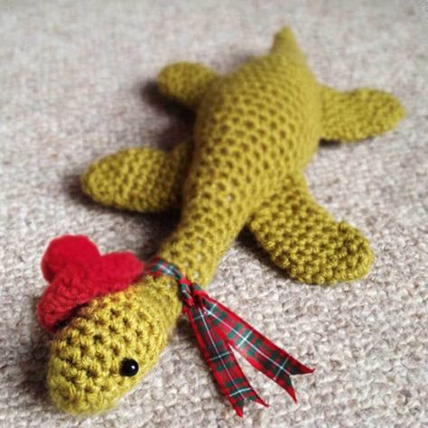 Learn how to crochet your very own amigurumi Loch Ness Monster called Nessie with this lovely kit! www.sweetgingeremporium.com Crochet Nessie, Monster Crochet, Simple Knitting, Gifts For Knitters, Crochet Monsters, Yarn Accessories, Crochet Blanket Designs, Knit Basket, Loch Ness Monster