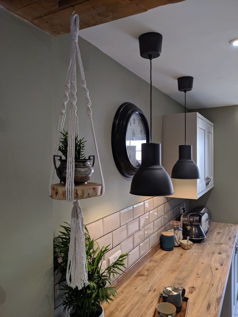 Macrame In Kitchen, White Green And Black Kitchen, Sage Green And Black Kitchen Ideas, Sage Green Walls In Kitchen, Sage Black And White Kitchen, Black Kitchen Green Wall, White Kitchen Sage Walls, Green Walled Kitchen, Kitchen With Sage Green Walls