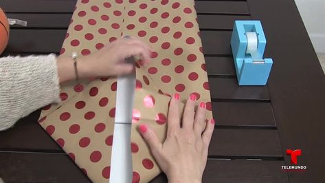 How to Make a Gift Bag From Wrapping Paper | NBC 7 San Diego Gift Bag From Wrapping Paper, Bag From Wrapping Paper, Make A Gift Bag, Brown Packing Paper, How To Make A Gift Bag, Paper Video, Gift Bags Diy, How To Wrap, Holiday Wrapping