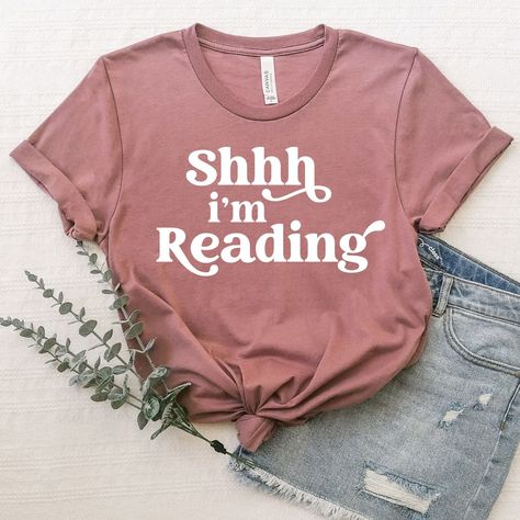 Shirt Designs Inspiration - Shh I'm Reading T-Shirt | Women's Graphic Bookish Shirt Designs, Book Lovers Shirts, Book Themed Shirts, Reading Tshirt Ideas, Bookish Cotton T-shirt With Slogan, Bookish Short Sleeve T-shirt With Funny Text, Bookish Cotton T-shirt With Letter Print, Bookish T Shirts, Bookish T-shirt With Funny Print