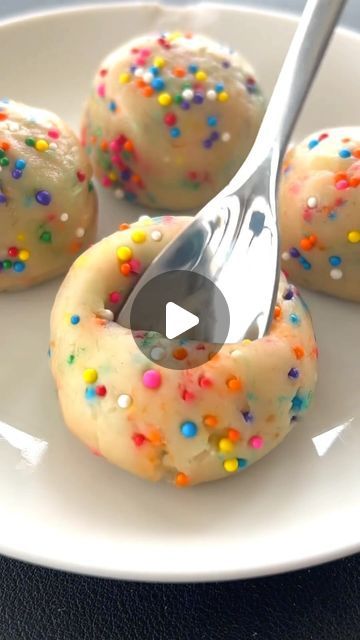 We’re Hungry on Instagram: "Edible sugar cookie dough recipe below🎉…
-7 tbsps (68g) All-Purpose Flour (heat treated)
-2 tbsp. Butter, melted
-1 tbsp. Brown Sugar 
-1 tbsp. Sugar
-Pinch of Salt
-2 tbsp. Milk
-1 tsp. Vanilla Extract
-2 tbsp. Rainbow Sprinkles

1. To heat treat the flour, put it in a microwave-safe bowl and microwave in four 30-second intervals, stirring between each one.
2. Add the butter, brown sugar, sugar, salt, milk, and vanilla extract to the bowl of flour and mix until everything combines.
3. Add the rainbow sprinkles to the bowl and mix them into the dough. 
4. Divide the dough into about 6 balls. Refrigerate or eat immediately. 
.
#sugarcookies #sugarcookie #cookiedough #ediblecookiedough #nobake #nobakedessert #dessert #desserts #desserttime #dessertlover #desserts Edible Sugar Cookie Dough Recipe, Edible Sugar Cookie Dough, Sugar Cookie Dough Recipe, Sugar Dough, Dessert Smoothie, Food Making, Keto Sweets, Cookie Dough Recipes, Edible Cookie Dough