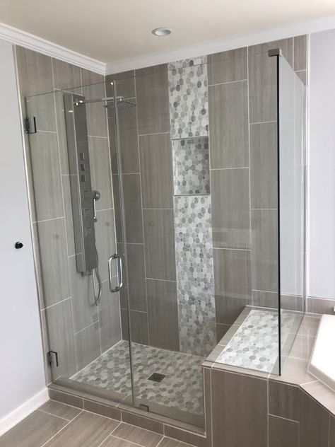 Newly renovated shower Shower Accent Tile Strip Master Bath, Seamless Shower Tile, Shower Ideas Bathroom Master Baths, Vertical Shower Tile, Lakehouse Bathroom, Shower Ideas Bathroom, Master Bath Ideas, Shower Accent Tile, Bathroom Redecorating