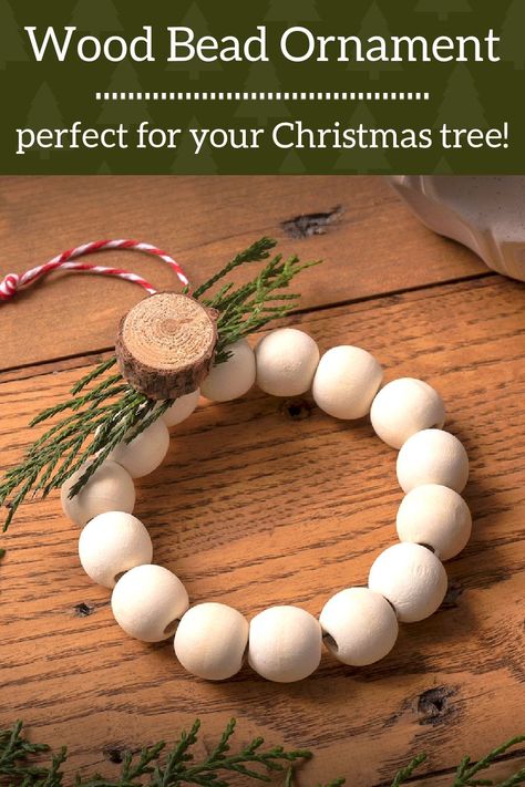 Learn how to make a wood bead ornament that looks beautiful on your Christmas tree! You can make this holiday craft in four simple steps. Wood Bead Wreath Ornament, Wooden Bead Wreath Ornament, Beginner Crafts, Christmas Craft Projects, Crochet Christmas Decorations, Mini Wreaths, Crochet Ornaments, Holiday Craft, Beaded Christmas Ornaments