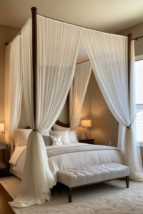 Canopy beds have long been associated with luxury and romance. These stunning centerpieces can instantly elevate your bedroom's ambiance and create a cozy, intimate space. Here are 15 inspiring canopy bed ideas to help you design the bedroom of your dreams. Jawai Bandh, Butterfly Organization, Wooden Canopy Bed, Modern Canopy Bed, Canopy Bed Frame, Earthy Bedroom, Bedroom Ambiance, Bed Photos, Makeover Bedroom