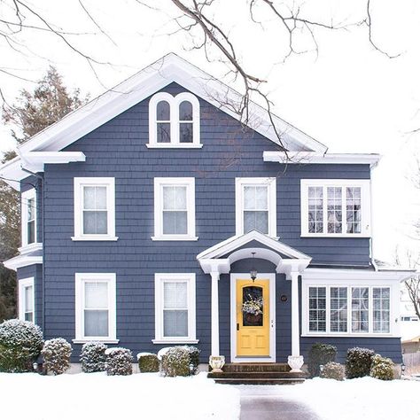 I have been seeing a number of blue houses with yellow doors lately. Such a great color scheme! #blue #yellow #frontdoor Door Colors For Blue House, Best Door Colors, House With White Trim, House Doors Colors, Navy Blue Houses, Yellow Front Door, Dark Blue Houses, Blue Houses, Best Front Door Colors