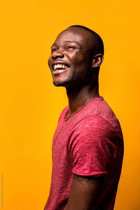 Young black man laughing besides a yellow background Happy Black Man, Man Laughing, Male Profile, Happy Black, Smiling Man, Young Black, Black Boys, Yellow Background, Black Men