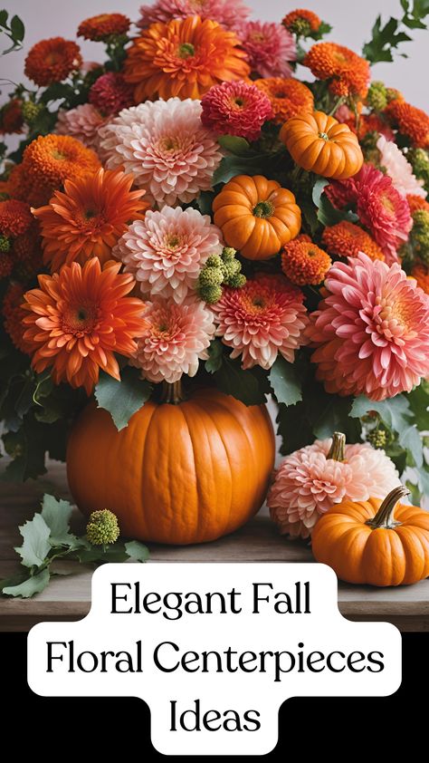 A pumpkin as an elegant flower vase, filled with vibrant orange and pink chrysanthemums and greenery. Dahlias Wedding Decor, Dahlia Wedding Centerpieces, Dahlia Centerpiece Wedding, Fall Engagement Parties, Fall Floral Centerpieces, Dahlias Wedding, Cozy Wedding, Centerpieces Ideas, Fall Wedding Flowers