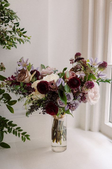 Lush bridal bouquet with floral colors in mauve, plum, eggplant, and cream. Bridal bouquet with texture and airy details. Fall wedding bouquets in muted colors. Bridesmaid’s bouquets consisting of roses, wildflowers, berries, and greenery. Design by Rosemary & Finch Floral Design in Nashville, TN. Plum Wedding Bouquet Fall, Mauve Bouquet Wedding, Fall Lavender Wedding, Mauve And Plum Wedding, Plum Wedding Colors, Mauve Bouquet, Plum Wedding Bouquet, Plum Wedding Flowers, Cream Bridal Bouquet