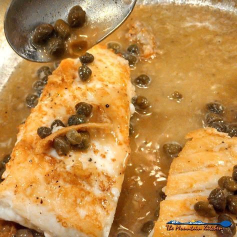 Halibut fillets with a caper butter sauce made of capers, garlic, wine and butter. Make a romantic meal in just 25 minutes. Halibut Recipes Baked, White Wine Butter Sauce, Roasted Halibut, White Wine Recipes, Poached Fish, Capers Recipe, Wine Butter, Oven Roasted Asparagus, Asparagus Recipes Roasted