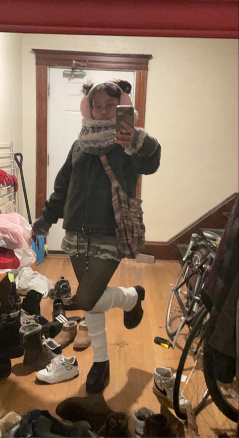 Camo short skirt pink plaid bag big pink fuzzy muffs white leg warmers fuzzy grey white scarf and a leather jacket. Another hello kitty goth moment. White Leg Warmers, Plaid Bag, Winter Fit, White Scarf, White Scarves, Camo Shorts, Cozy Winter, Pink Plaid, Short Skirt