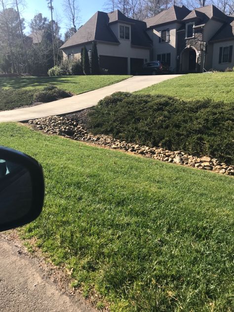 Front Yard Roadside Landscaping, Driveway Ditch Landscaping, Landscaping Ditch By Road, Ditch Landscaping Roadside, Large Yard Landscaping Ideas, Ditch Landscaping, Ditch Ideas, Driveway Wall, Riverbed Landscaping