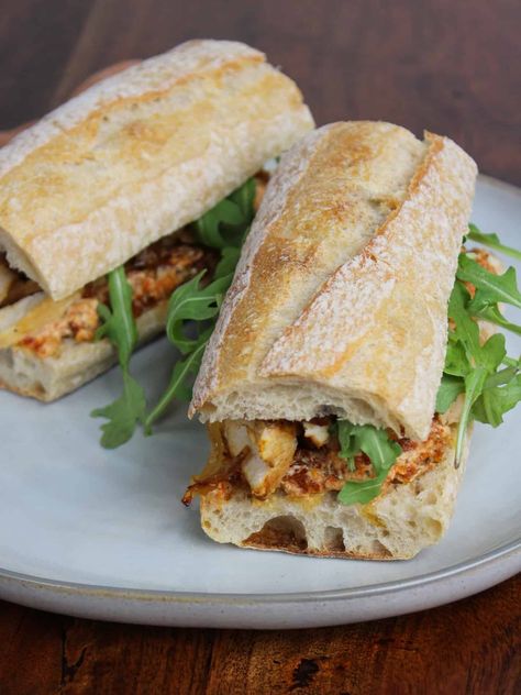 Make this fresh and healthy chicken and goat cheese sandwich with sun-dried tomatoes, caramelized onions, and arugula for a delicious lunch. Goat Cheese Chicken Sandwich, Sandwich With Goat Cheese, Chicken Arugula Sandwich, Chicken And Cheese Sandwich, Goat Cheese Sandwich Recipes, Chicken And Goat Cheese Recipe, Fall Sandwich, Chicken And Goat Cheese, Goat Cheese Chicken