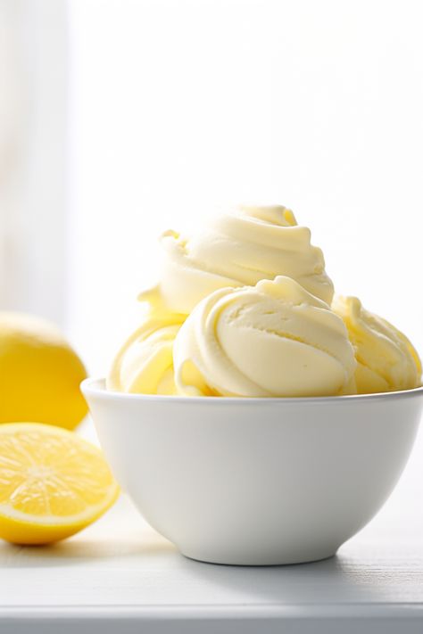 Delicious and Easy Lemon Curd Keto Ice Cream Recipe: A Low Carb Treat #ketodiet #ketorecipes #lowcarb Keto Lemon Frosting, Lemon Keto Dessert, Keto Lemon Mousse Low Carb, Keto Lemon Curd Cheesecake, Low Carb Lemon Curd, Keto Ice Cream Recipe, Lemon Curd Ice Cream, Low Carb Treat, Keto On A Budget