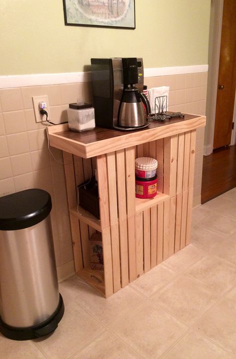 Coffee bar made from--crates from Michaels, laminate flooring from Lumber Liquidators (countertop), framed by pine boards from Lowes. Crates can be arranged to add or remove shelves. Crate Shelves Kitchen, Crate Coffee Bar, Wood Crate Diy, Wood Crate Shelves, Crate Desk, Crate Crafts, Crate Decor, Diy Wooden Crate, Crate Furniture Diy