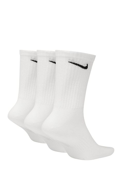 Power through your workout with the Nike Everyday Socks. Soft yarns with sweat-wicking technology help keep your feet comfortable and dry.- Pack of 3- Dri-FIT technology helps your feet stay dry and comfortable.- Crew silhouette covers your ankle and lower calf.- Ribbed cuffs help keep the socks in place.- Arch band provides a supportive feel.- Imported Machine wash    60% cotton/37% polyester/3% spandex Hogh Socks, High Ankle Socks, Long White Nike Socks, Nike Socks Dri Fit, Preppy Nike Socks, White Nike Socks Outfit, Nike Clothes Women, Nike Socks Women, Socks Over Leggings Outfit