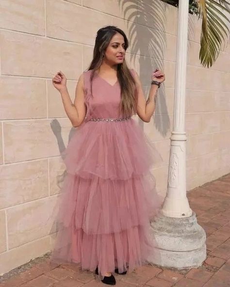 Trendy Elegant Women Gowns Name: Trendy Elegant Women Gowns Fabric: Net Sleeve Length: Sleeveless Pattern: Solid Net Quantity (N): 1 Sizes: Free Size (Bust Size: 42 in, Length Size: 56 in) FABRICS DETAIL * GOWN * #GOWN FABRIC :SOFT BUTTERFLY NET WITH SHORT SLEEVES WITH FULL FLYR RUFFLES FENCY *#GOWN INAR * :MICRO COTTON #GOWN LANGTH :56 INCH # GOWN SIZE. : free size (fullstitched ) *#GOWN FLYR *:TOTAL 8 MITER USE IN NET ?? WEIGHT : 900 gm Country of Or Net Gown, Women Gown, Net Gowns, Butterfly Net, Ladies Gown, Frock Design, Vintage Vogue, Beautiful Gowns, Well Dressed