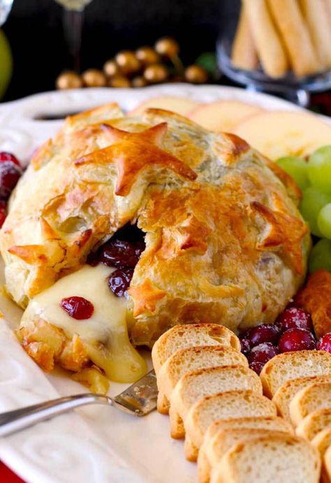 Quick, easy, luxurious and totally scrumptious. This Brie and Cranberries Baked in Puff Pastry is the perfect appetizer for the holiday season! Brie Recipes Appetizers, Baked Brie Appetizer, Baked Brie Recipes, Cranberry Baking, Brie Puff Pastry, Brie Appetizer, Brie Recipes, Lemon Blossoms, Brie Cheese