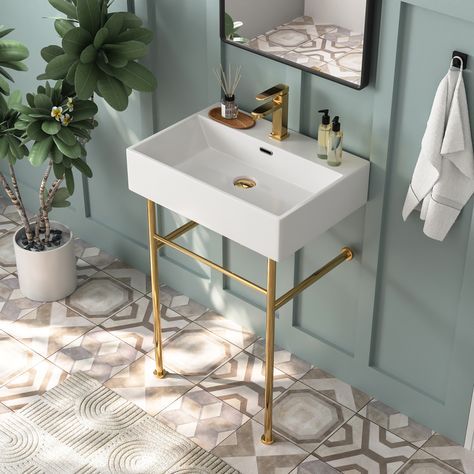 Crafted from premium ceramic, this console sink boasts exceptional scratch and stain resistance. Its spacious design allows for use by almost two people simultaneously, making it perfect for busy households. The open design adds a sense of space and openness to your bathroom. With 3 elegant color options to match your decor, the stainless steel console legs offer classic styling and convenient integrated front and side bars for towel storage. With an overflow, ergonomic design, and the perfect h Sink Legs, Bathroom Console, Console Bathroom Sink, Bathroom Sink Design, Bathroom Sink Tops, Console Sink, Console Sinks, Towel Storage, Sink Design