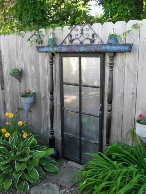 With some imagination and fun, exciting “do-it-yourself” work, you can fashion a small backyard into a cozy, relaxing, enticing corner of your home's property. Secret Door, Fence Decor, Wooden Fence, Unique Gardens, Chic Kitchen, Old Door, Old Doors, Party Diy, Plants And Flowers