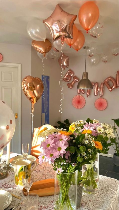 Birthday decorations heart shaped balloons orange pink and white flower bouquet metallic peach happy birthday balloon banner Simple Birthday Set Up Ideas At Home, Birthday Dorm Decorations, Happy Birthday Mom Decoration Ideas, Moms Birthday Decor, Birthday Table Simple, Birthday Morning Decorations, Simple Birthday Table Set Up At Home, Birthday Table Setting Ideas Simple, At Home Birthday Decorations