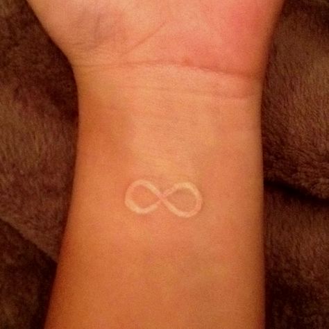 White infinity symbol tattoo <3 White Infinity Tattoo, Infinity Symbol Tattoos, Infinity Symbol Art, Couple Tattoo Quotes, Infinite Tattoo, Couple Tattoos Love, Infinity Symbol Tattoo, Tattoo Number, White Infinity