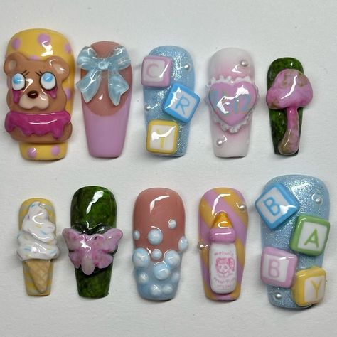 custom melanie martinez set!! they wanted a mix of portals, k-12, and cry baby! i had so much fun making this set and i tried a lot of new things 💗 #nails #nailsnailsnails #gelx #gelnails #gelxnails #melaniemartinez #crybaby #k12 #portals #explore #explorepage #trending #customnails #pressons Melanie Martinez Nail Art, Cry Baby Nails Melanie Martinez, Melanie Martinez Nails Inspired Cry Baby, Melanie Martinez Nails Trilogy, Cry Baby Nails, Melanie Martinez Nails K-12, Melanie Martinez Inspired Nails, Melanie Nails, Melanie Martinez Nails