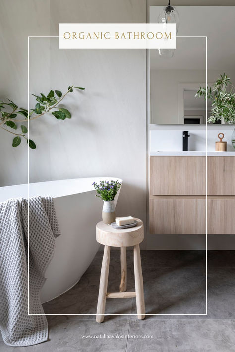 We love the vibe of this Primary Bathroom Remodel full of neutral tones.  We selected neutral tiles for the walls and contrasting cement-looking floors. A warm touch is added by the natural-colored wood vanity, and matte black plumbing fixtures compliment the design and add a versatile look. We love how all the natural light coming through the picture window contributes to the stunning atmosphere of this Bathroom design. Neutral Tile, Picture Windows, Wood Vanity, Double Sink, Bathroom Style, Wet Rooms, Interior Photography, Free Standing Tub, Walk In Shower